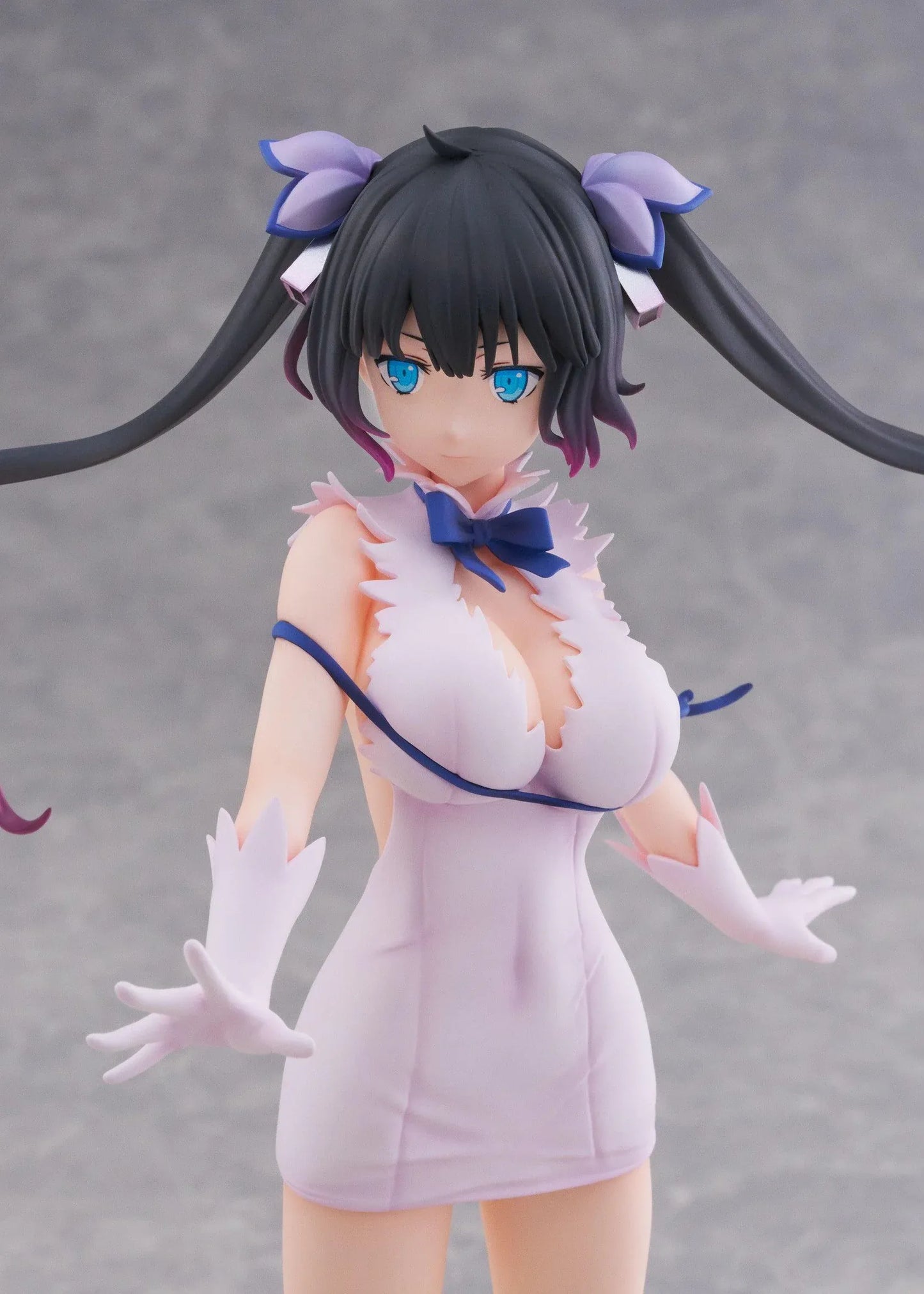 Is It Wrong to Try to Pick Up Girls in a Dungeon V Hestia Divinity Unleashed Limited Edition Ver. 1/7 Scale Figure with twin-tails, white outfit, blue ribbon accents, rocky base, and flame effect parts