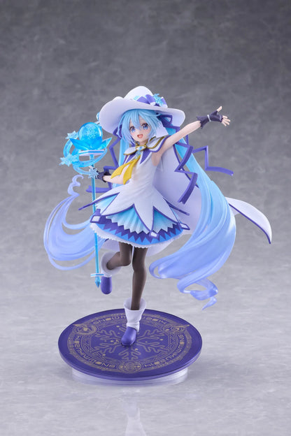 Snow Miku All Stars 2014 Ver. AMP+ figure wearing a white-and-blue snow sorceress outfit and holding a translucent magical staff.