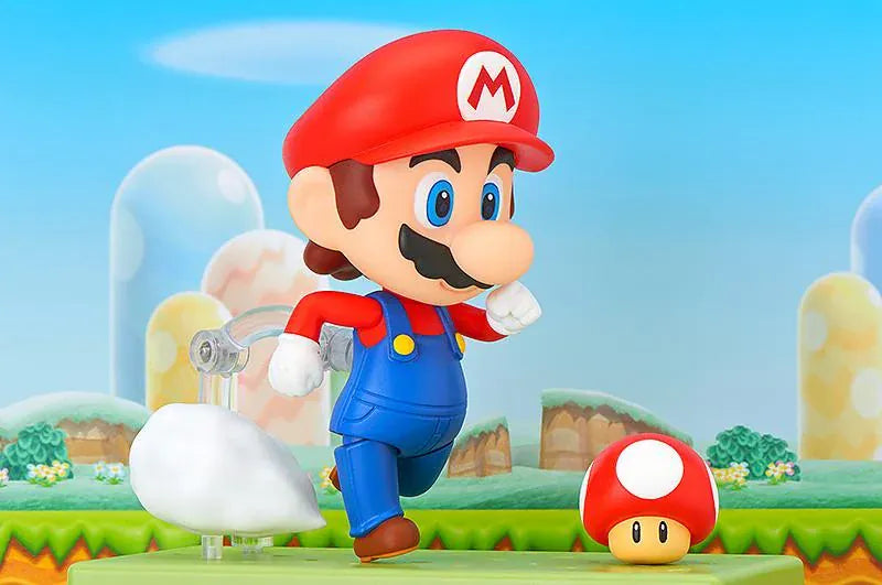 Super Mario Nendoroid Mario figure wearing his red hat and blue overalls in a running pose