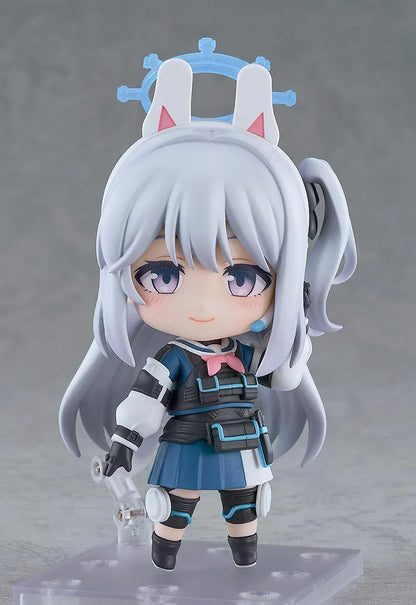 Blue Archive Nendoroid Miyako Tsukiyuki with silver hair, rabbit-ear headband, blue halo, white jacket, blue skirt, and black tactical gear.