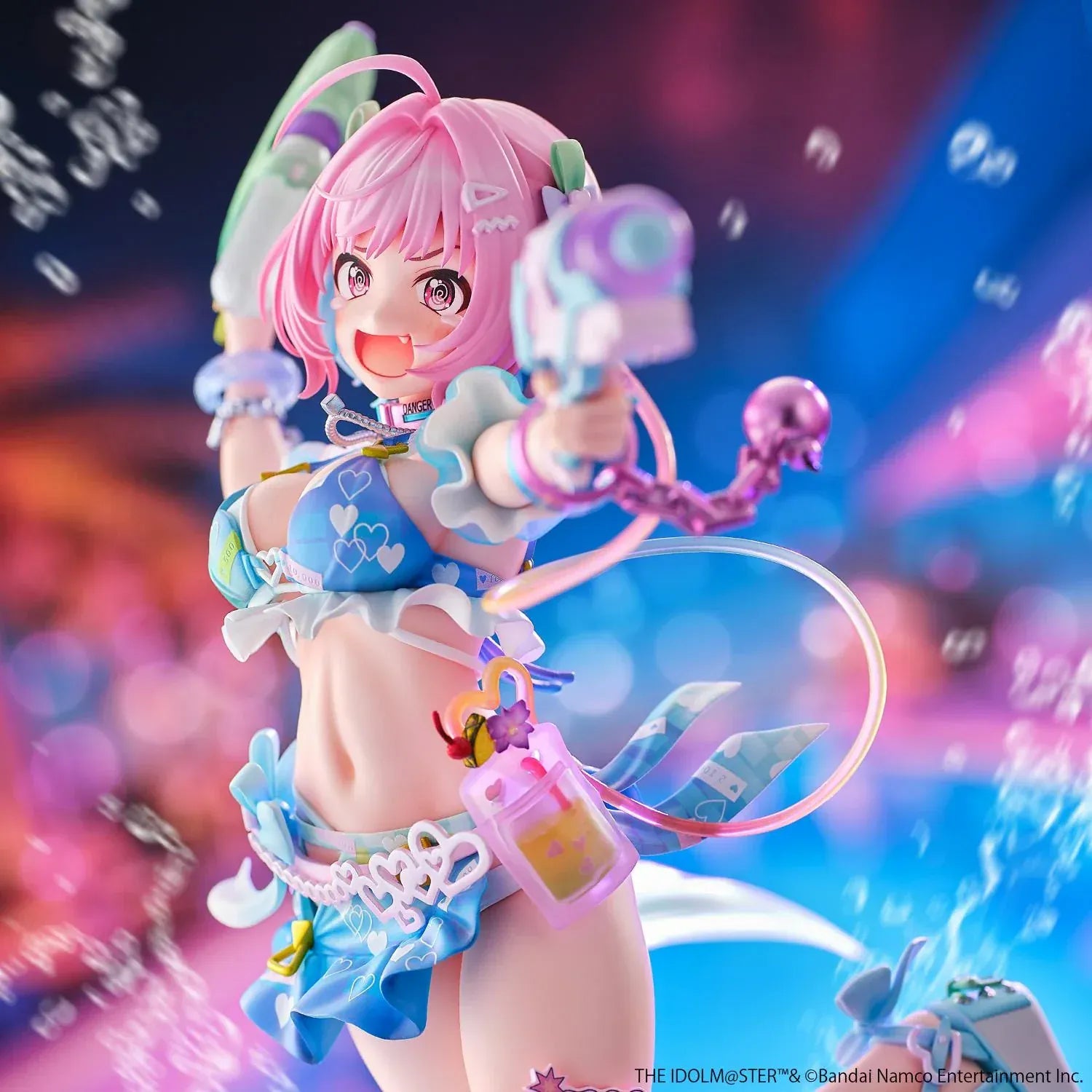 Riamu Yumemi 1/6 scale figure from The Idolmaster Cinderella Girls in pastel blue idol outfit holding water gun accessory on clear display base