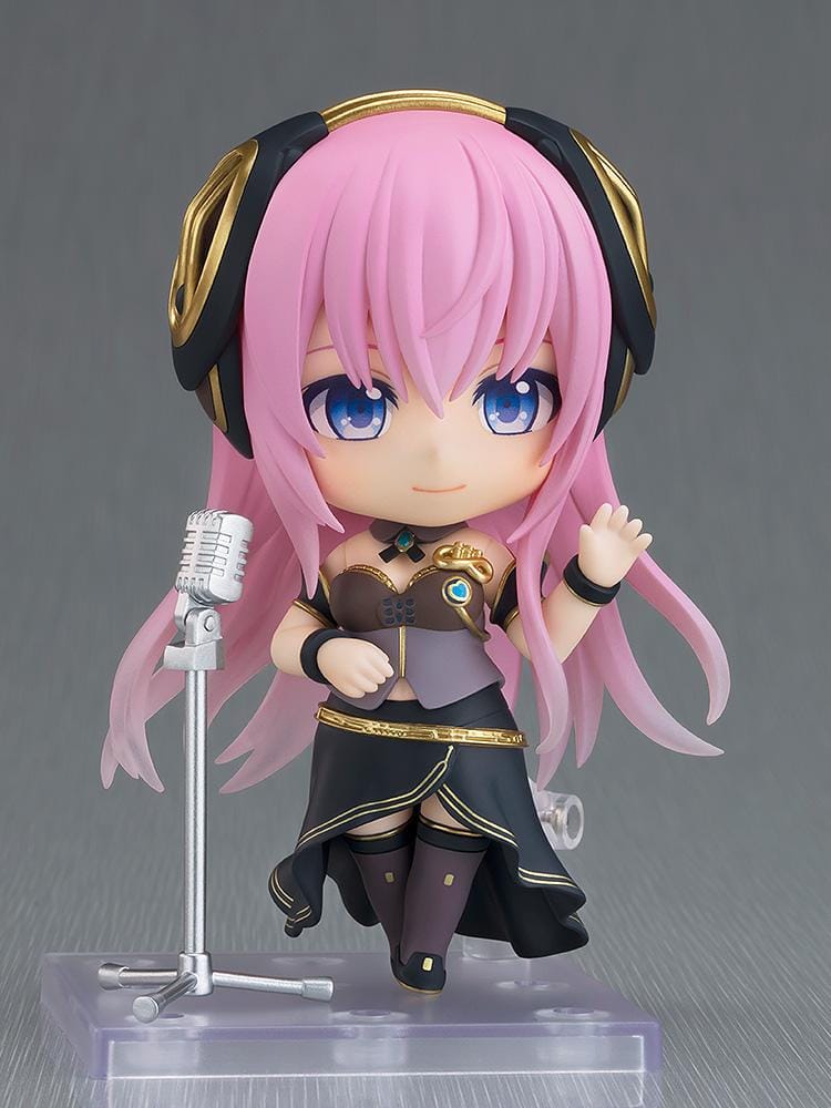 Hatsune Miku Nendoroid Megurine Luka V4X Figure with pink hair, headset, blue eyes, and black and gold Vocaloid outfit