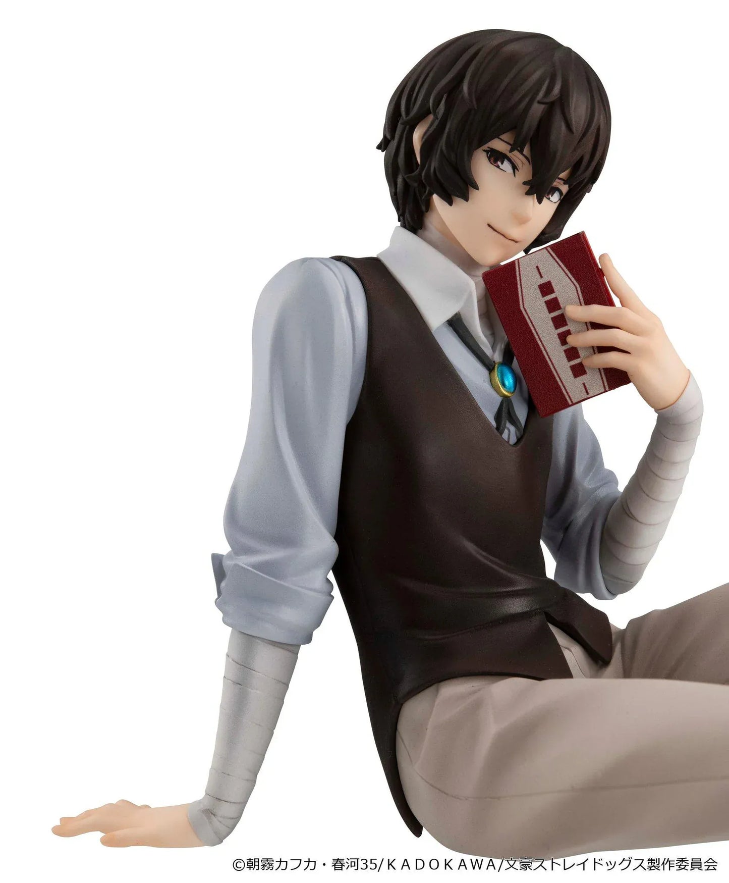 Bungo Stray Dogs G.E.M. Series Dazai-san Palm Size Figure seated and holding a book
