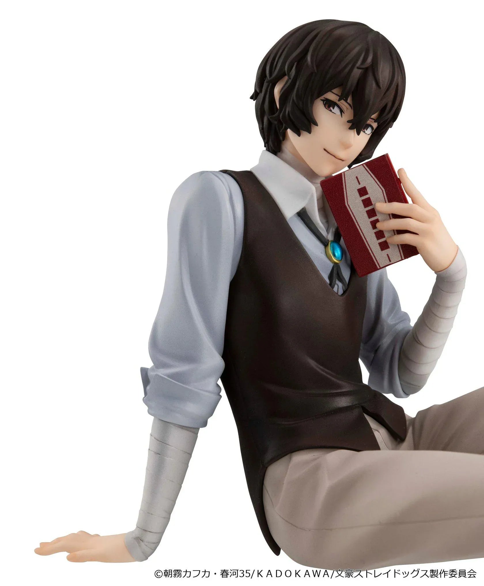Bungo Stray Dogs G.E.M. Series Dazai-san Palm Size Figure seated and holding a book