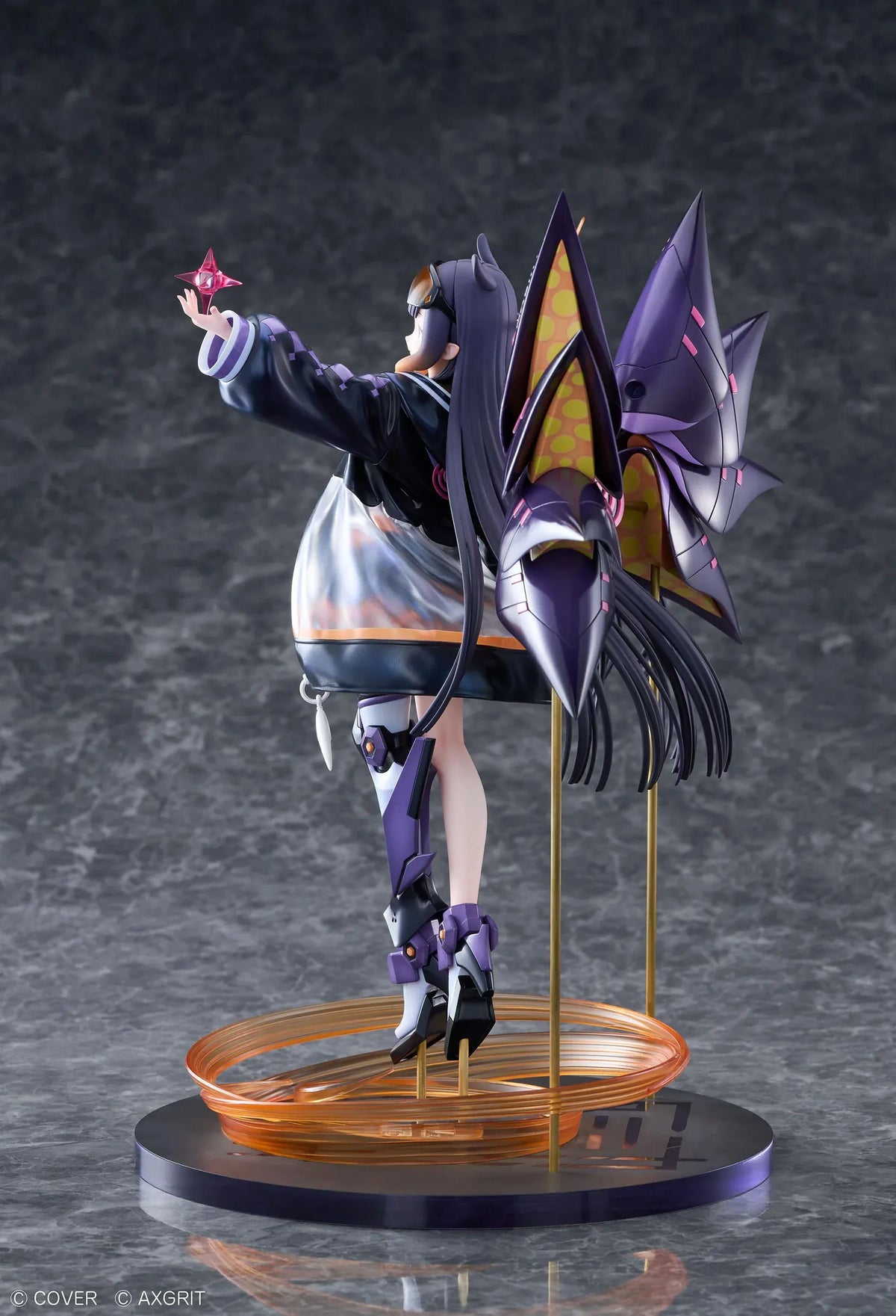 Ninomae Ina’nis AXGRIT Ver. figure with flowing dark hair, an oversized jacket, armored boots, purple mechanical elements, and orange rings above a circular base.