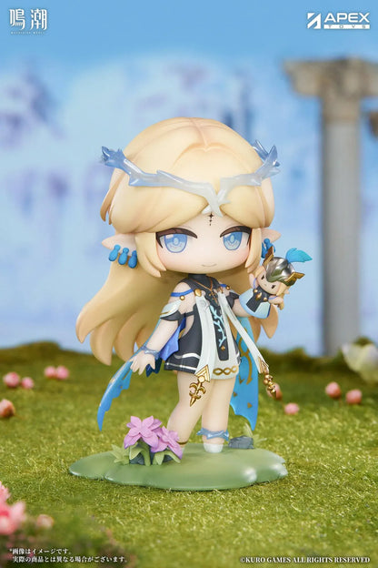 Chibi Cartethyia Jinseki Series figure with blonde hair, blue eyes, a pale blue headpiece, and a small armored companion, standing on a green floral base.