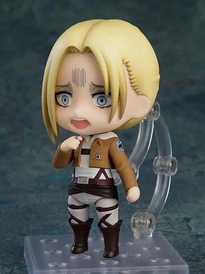 Attack on Titan Nendoroid Annie Leonhart rerelease figure with blonde hair, military uniform, dual blades, and vertical maneuvering equipment.