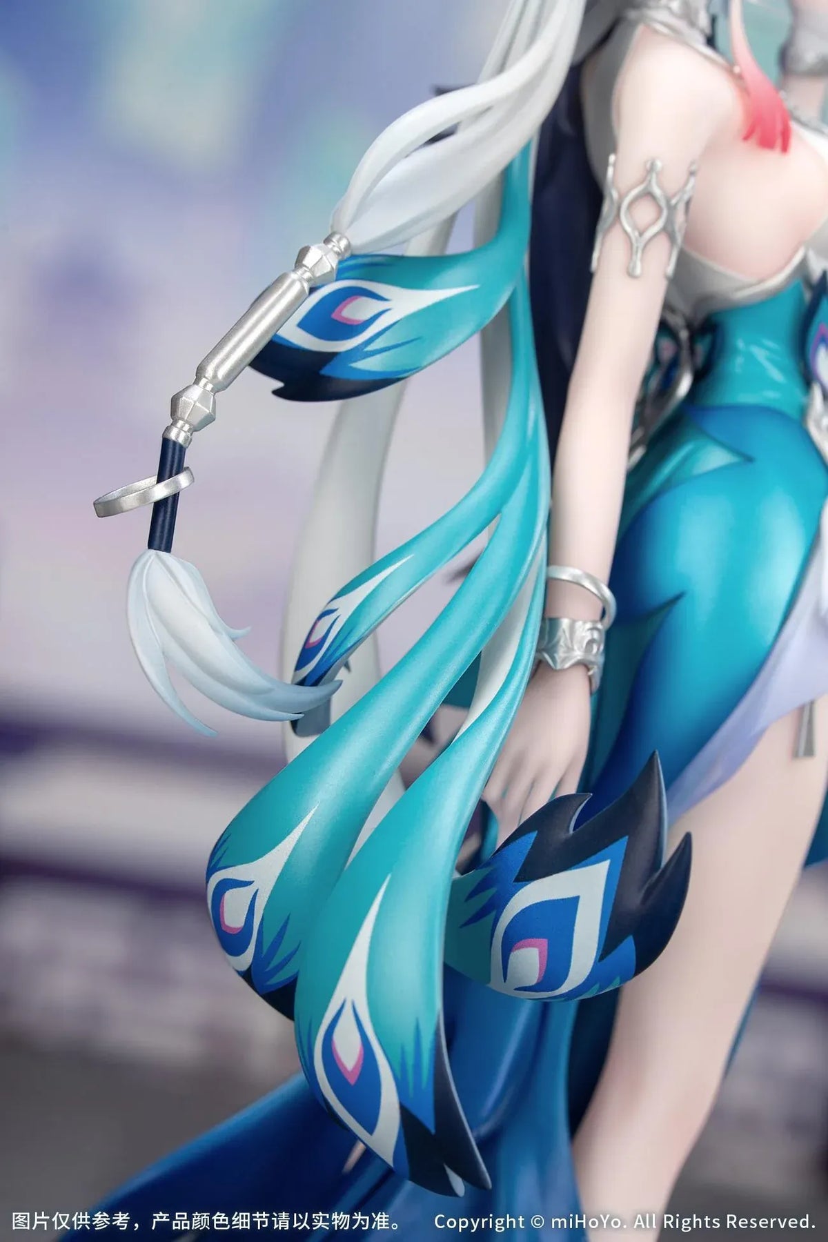 Yao Guang 1/8 scale figure wearing an elegant white-and-teal outfit with silver ornaments and feather-inspired decorations.