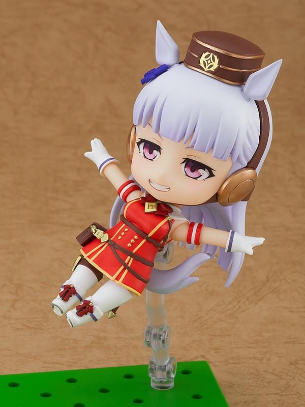 Umamusume Pretty Derby Nendoroid Gold Ship figure wearing her signature red and white outfit with horse ears, tail, and headgear