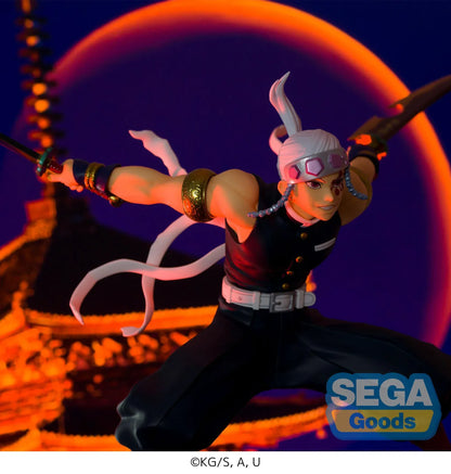 Demon Slayer FIGURIZMα Tengen Uzui figure in a wide stance with twin chained blades extended, a jeweled headband, and gold arm bands on a white base.