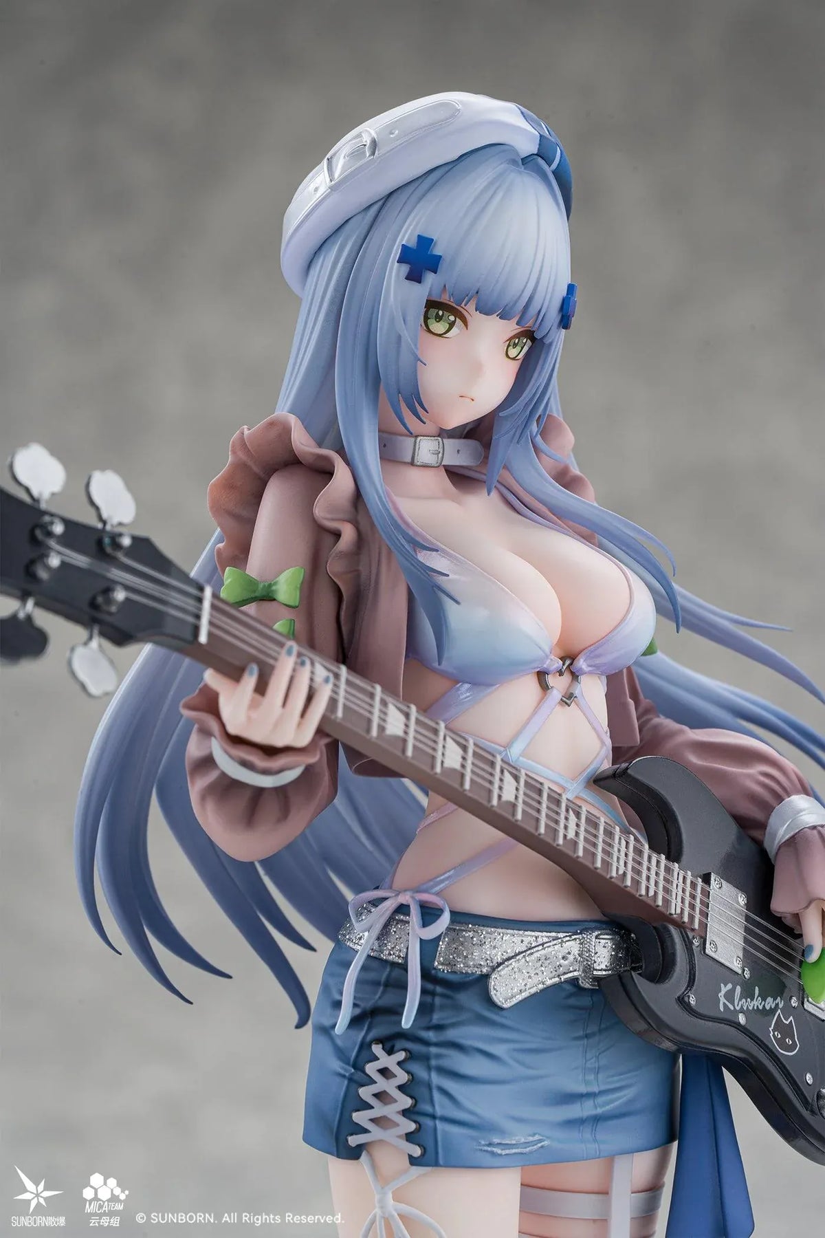 Girls' Frontline Klukai 10th Anniversary 1/6 scale figure with pale blue hair, a beret, brown jacket, blue skirt, and black bass guitar.