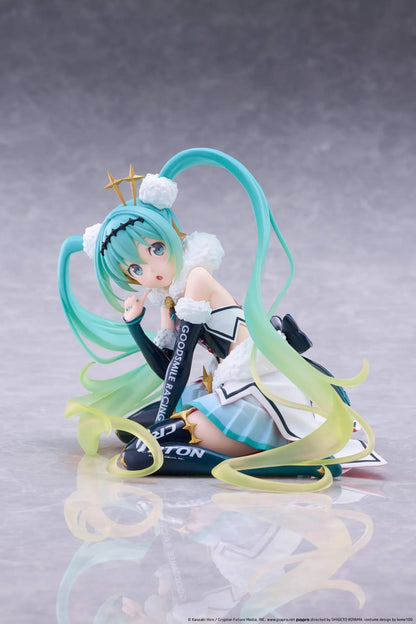 Racing Miku 2018 Ver. Round 8 figure seated in a white, black, and turquoise racing outfit with long gradient twin tails.