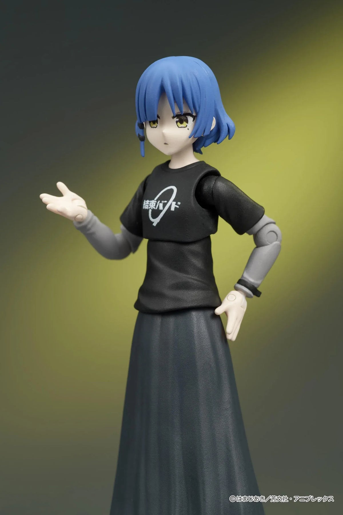 Bocchi the Rock! DIGACTION Ryo Yamada figure playing a cream-colored bass, with blue hair, closed eyes, a black band T-shirt, and long dark skirt.