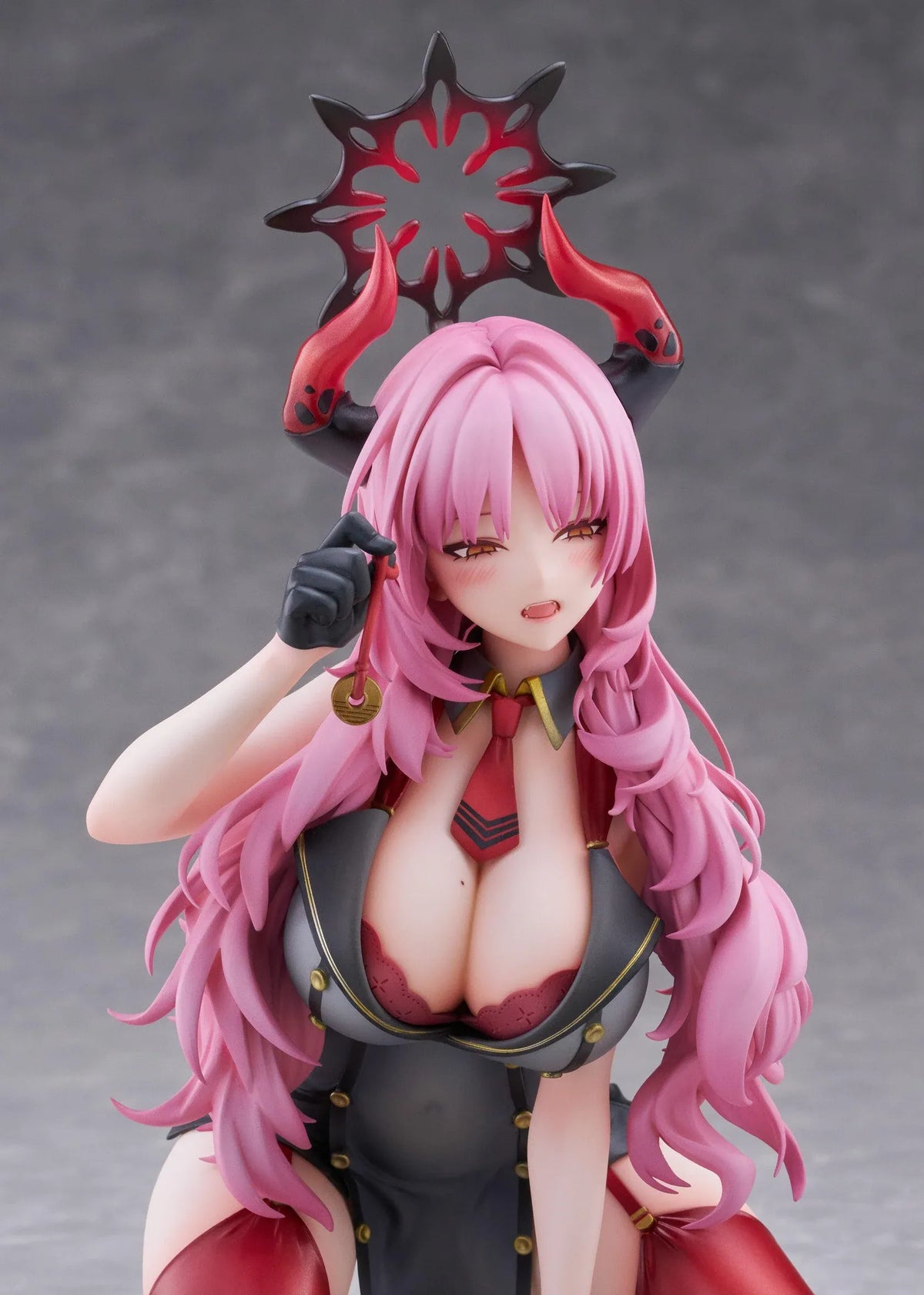 Blue Archive Satsuki Memorial Lobby 1/7 scale figure kneeling in a black-and-red outfit with flowing pink hair, horns, and a dark halo.