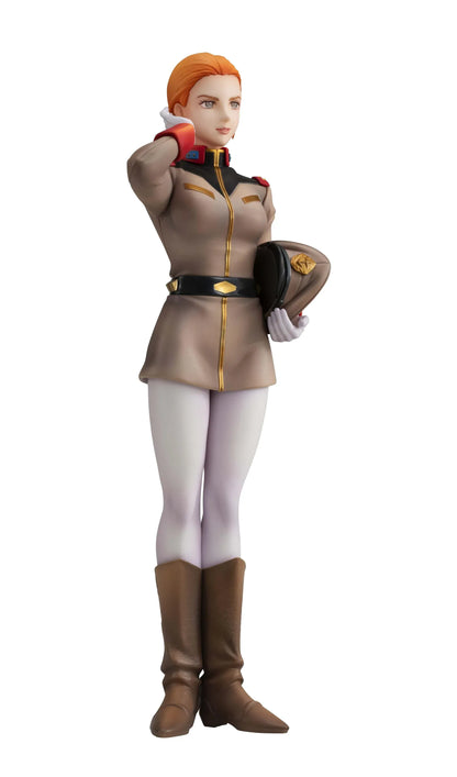 Gundam Girls Generation Matilda Ajan figure saluting in a tan military uniform and peaked cap, holding a green folder, with white trousers and brown boots.