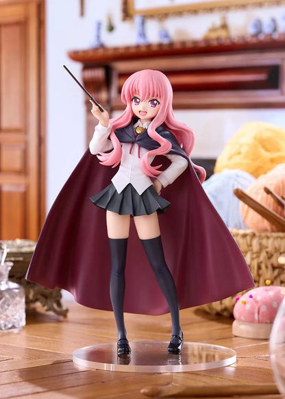 POP UP PARADE Louise L Size figure with flowing pink hair, a raised wand, white blouse, dark skirt, and a cape with burgundy lining.