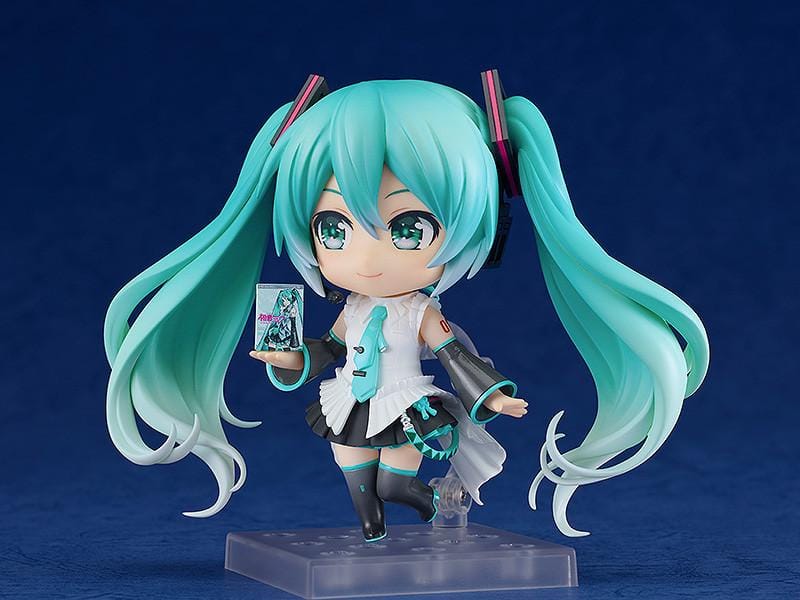 Hatsune Miku Happy 16th Birthday Ver. Nendoroid figure with turquoise twin-tails, white outfit, microphone, and translucent wings