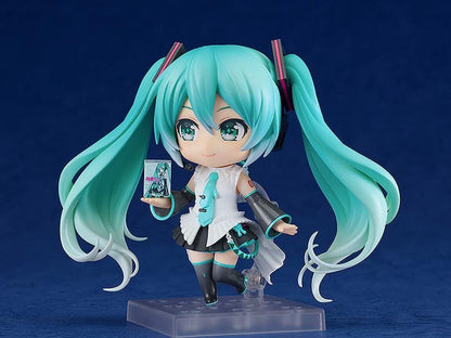 Hatsune Miku Happy 16th Birthday Ver. Nendoroid figure with turquoise twin-tails, white outfit, microphone, and translucent wings