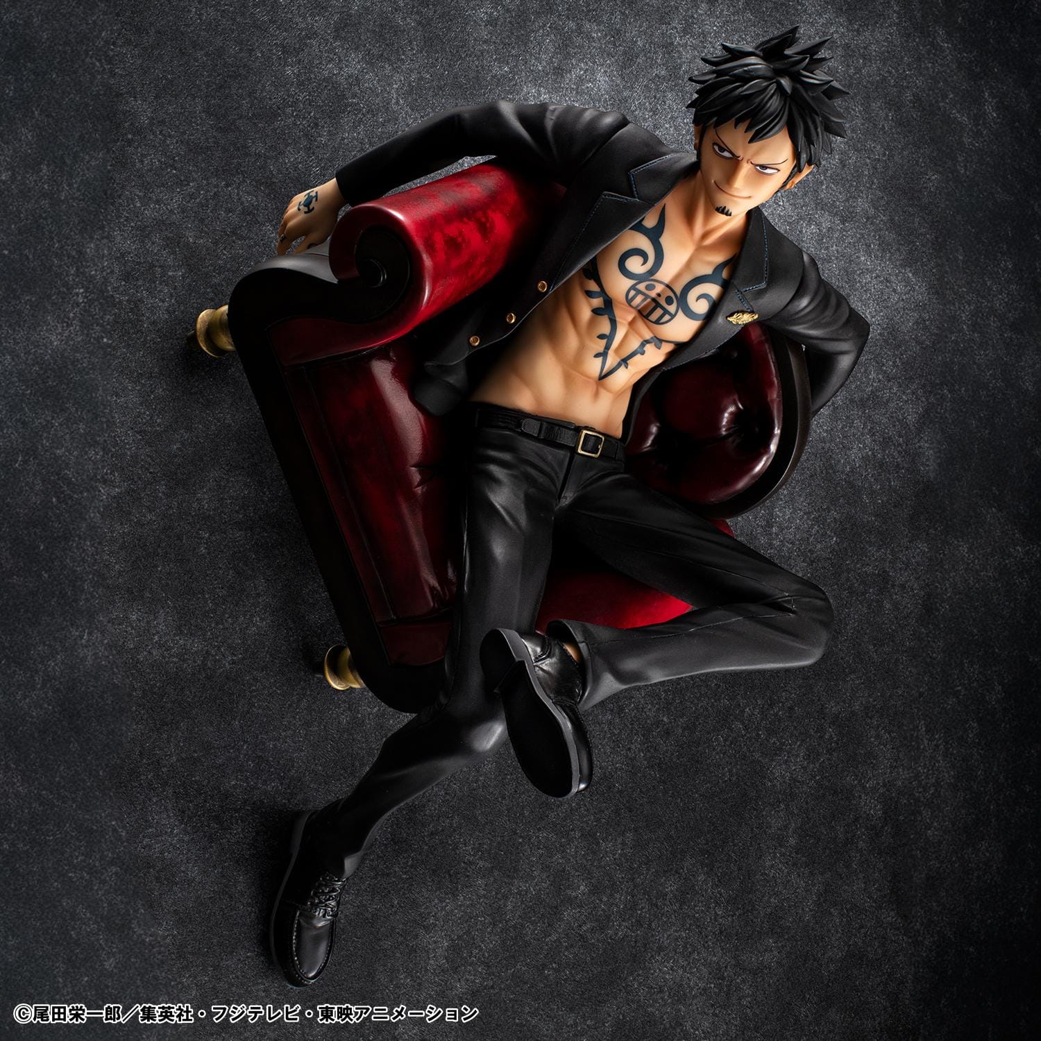 One Piece Portrait Of Pirates S.O.C. Trafalgar Law Ver. R Figure wearing a black suit and sitting in a red armchair