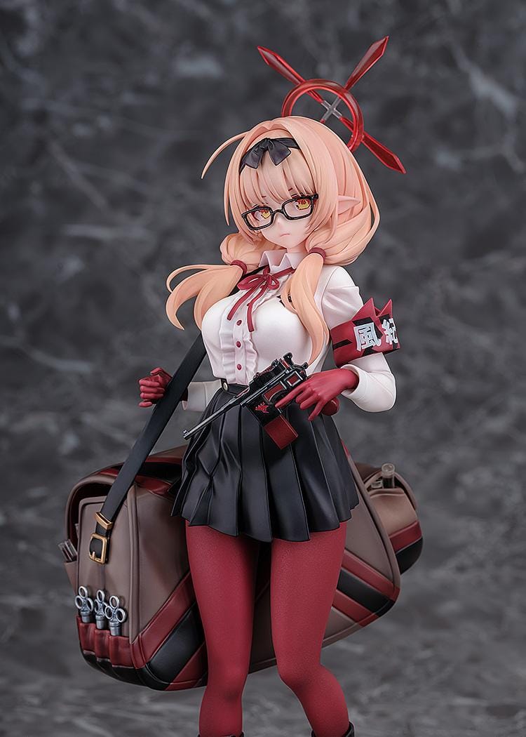 Blue Archive Chinatsu 1/7 Scale Figure featuring Chinatsu with pink hair, glasses, red gloves, halo detail, weapon accessory, and a large bag.