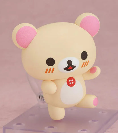 Rilakkuma Nendoroid Korilakkuma Figure with cream-colored bear design, pink ears, red button detail, white belly, and chibi display base