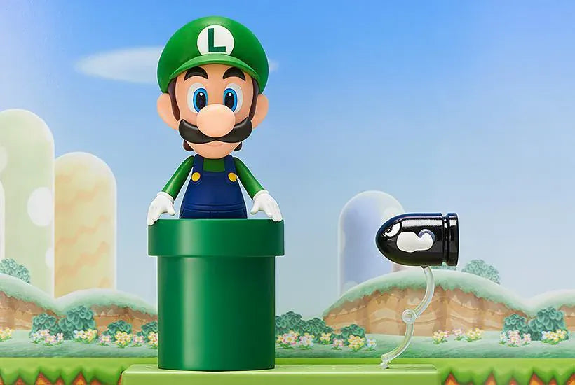 Super Mario Nendoroid Luigi figure wearing his green hat and blue overalls in a running pose