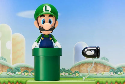 Super Mario Nendoroid Luigi figure wearing his green hat and blue overalls in a running pose
