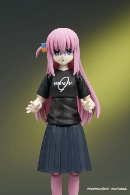 Bocchi the Rock! DIGACTION Hitori Gotoh figure holding a black and gold guitar, wearing a black band T-shirt, dark skirt, and pink leggings.