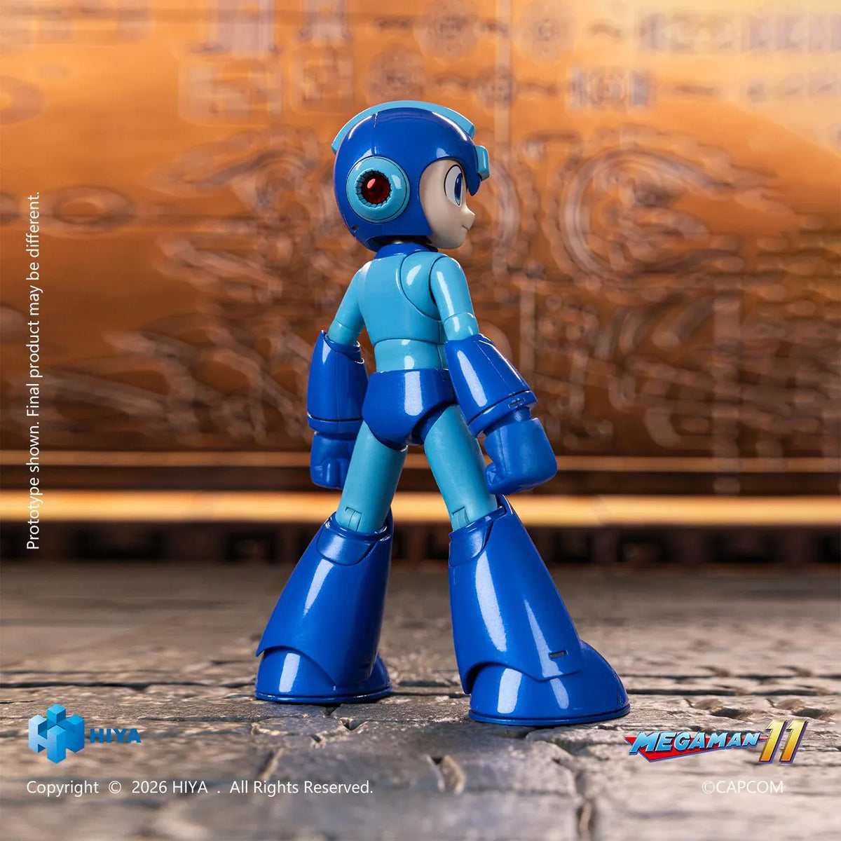 Mega Man Original Series action figure by Hiya Toys with interchangeable faces, hands, Mega Buster, charged-shot effect, and clear display stand.