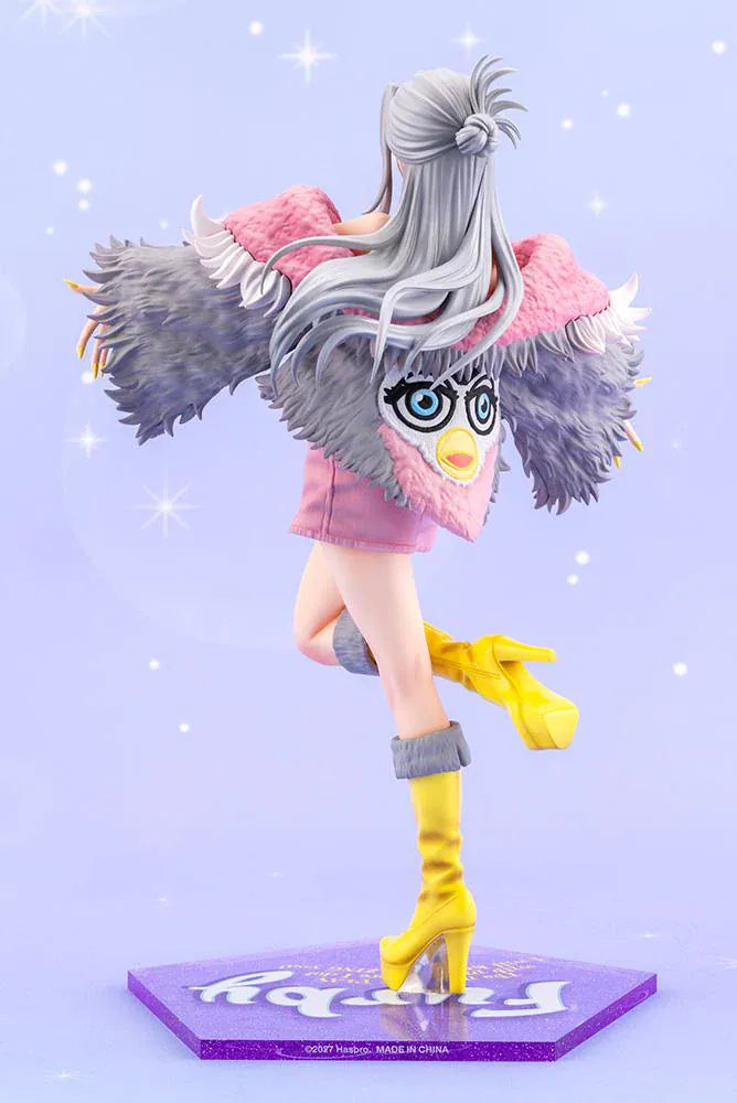 Furby Bishoujo Figure with fashionable character in sunglasses, fuzzy jacket, yellow boots, Furby companion, and glittery display base
