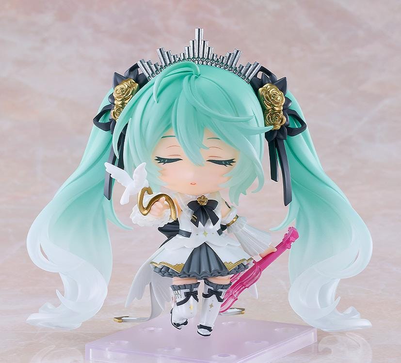 Hatsune Miku Nendoroid Hatsune Miku Symphony 10th Anniversary Ver. Figure featuring Miku with teal twin tails, white and black concert outfit, gold rose accents, and symphony-inspired details.
