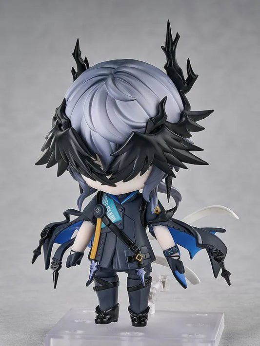 Arknights Logos Nendoroid figure with gray hair, pink eyes, black horn and feather-like details, and a dark coat with blue lining.