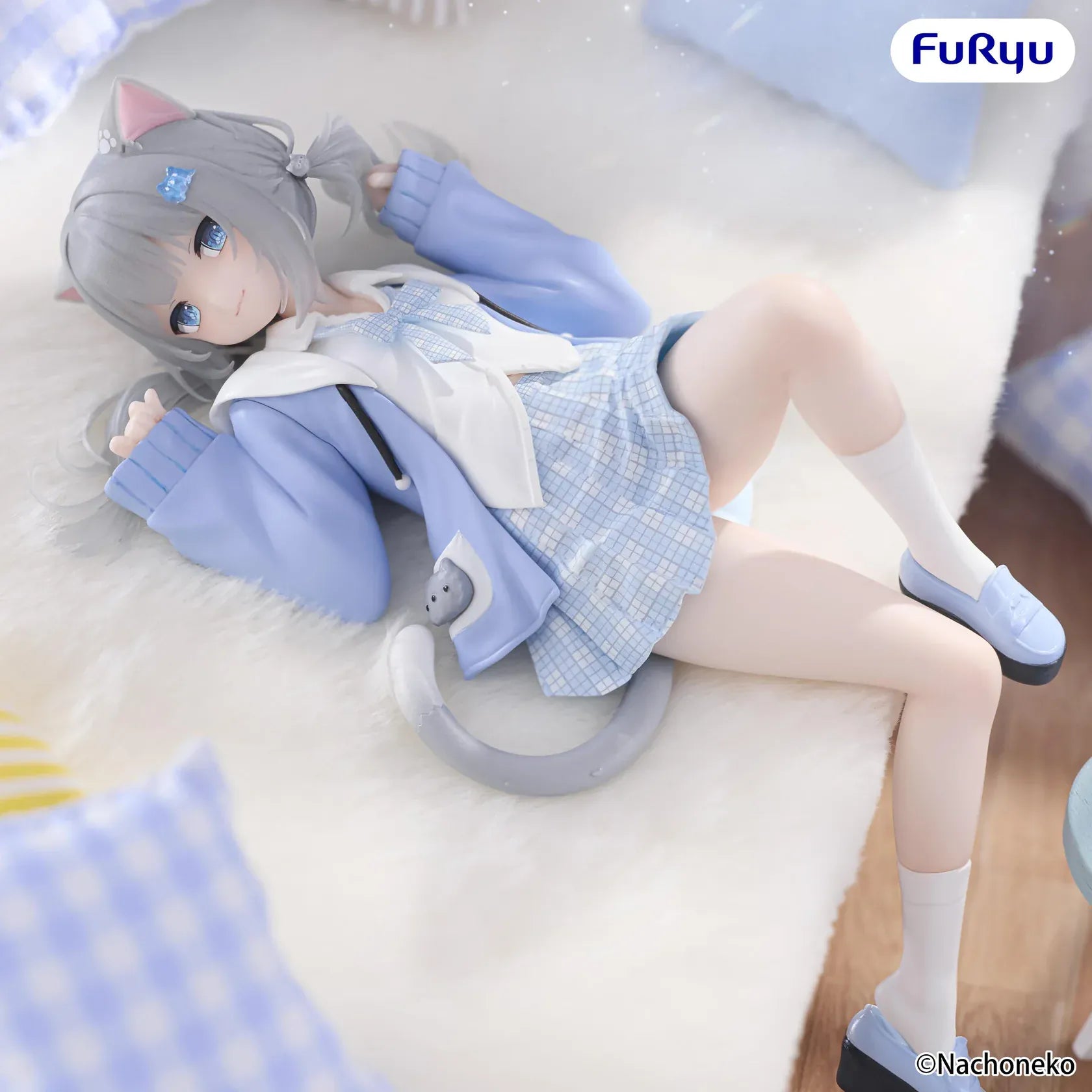 Nachoneko Noodle Stopper Figure by FuRyu featuring Nachoneko lying down in a blue outfit with cat ears and a cushion base.