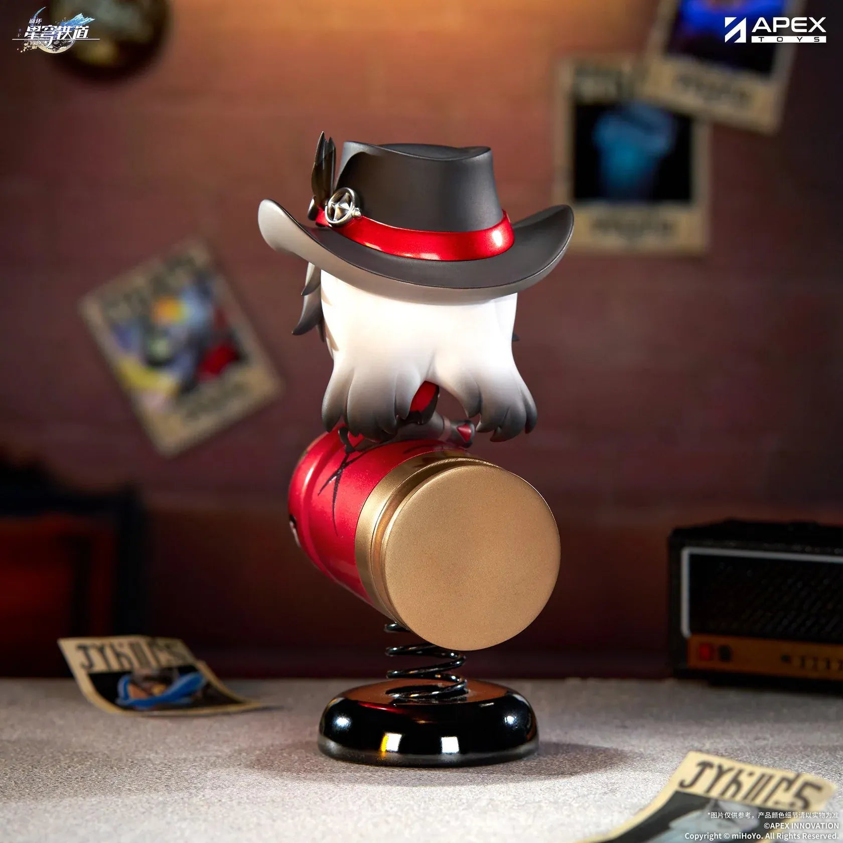 Honkai Star Rail Happy Shake Boothill Chibi Figure sitting on a red spring-mounted rocking base with his signature cowboy hat