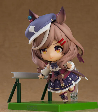 Umamusume Pretty Derby Nendoroid Matikanetannhauser Figure Rerelease featuring Matikanetannhauser with horse ears, brown hair, signature hat, race-inspired outfit, and cheerful pointing pose.
