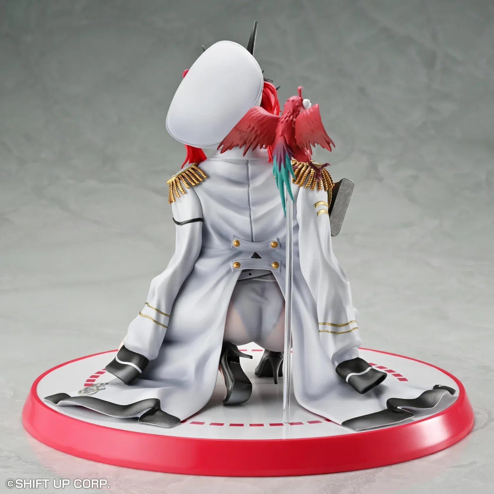 Goddess of Victory: Nikke Mast 1/7 scale figure kneeling on red-and-white base in white naval uniform with rifle and red parrot