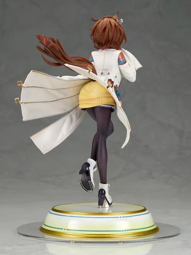 Agnes Tachyon 1/7 scale figure wearing an oversized white laboratory coat, yellow sweater, and dark tights on a decorative base.