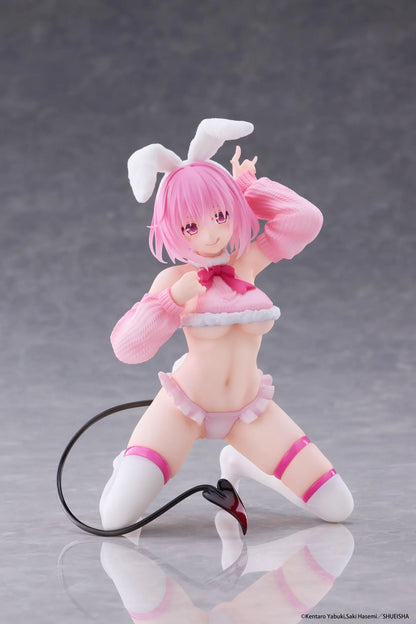To Love-Ru Darkness MOFLOCK Momo Fluffy Bunny Ver. Figure featuring a pink-haired anime girl with pink eyes, white bunny ears, a pink fluffy bunny outfit, matching sleeves, white thigh-high stockings, and a black devil tail in a playful kneeling pose.