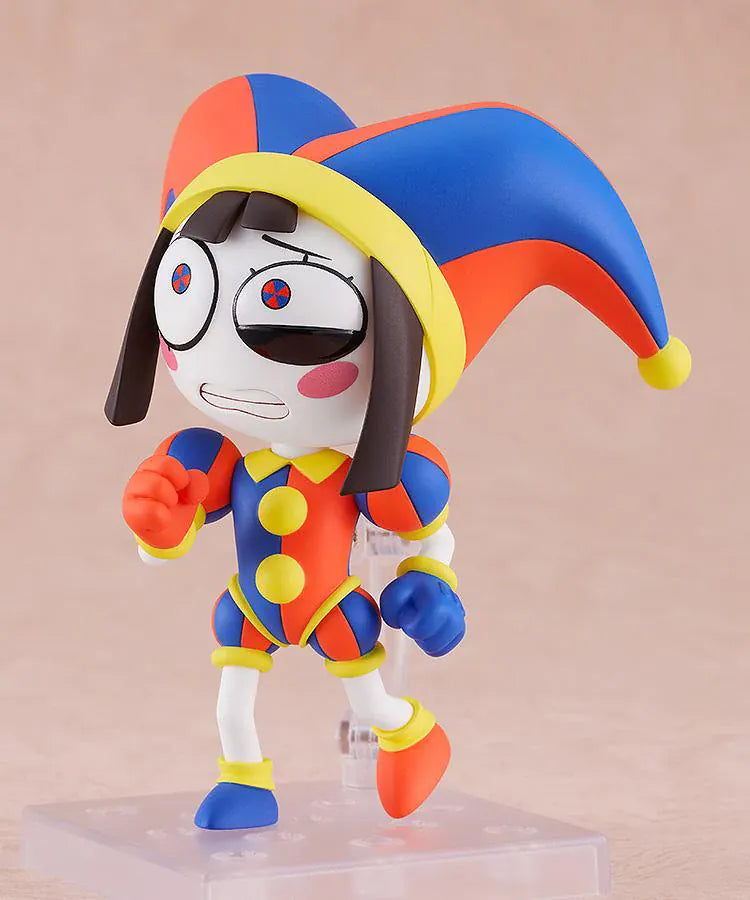 The Amazing Digital Circus Nendoroid Pomni Figure Rerelease featuring Pomni in a colorful red, blue, and yellow jester outfit with oversized hat and mismatched shoes.