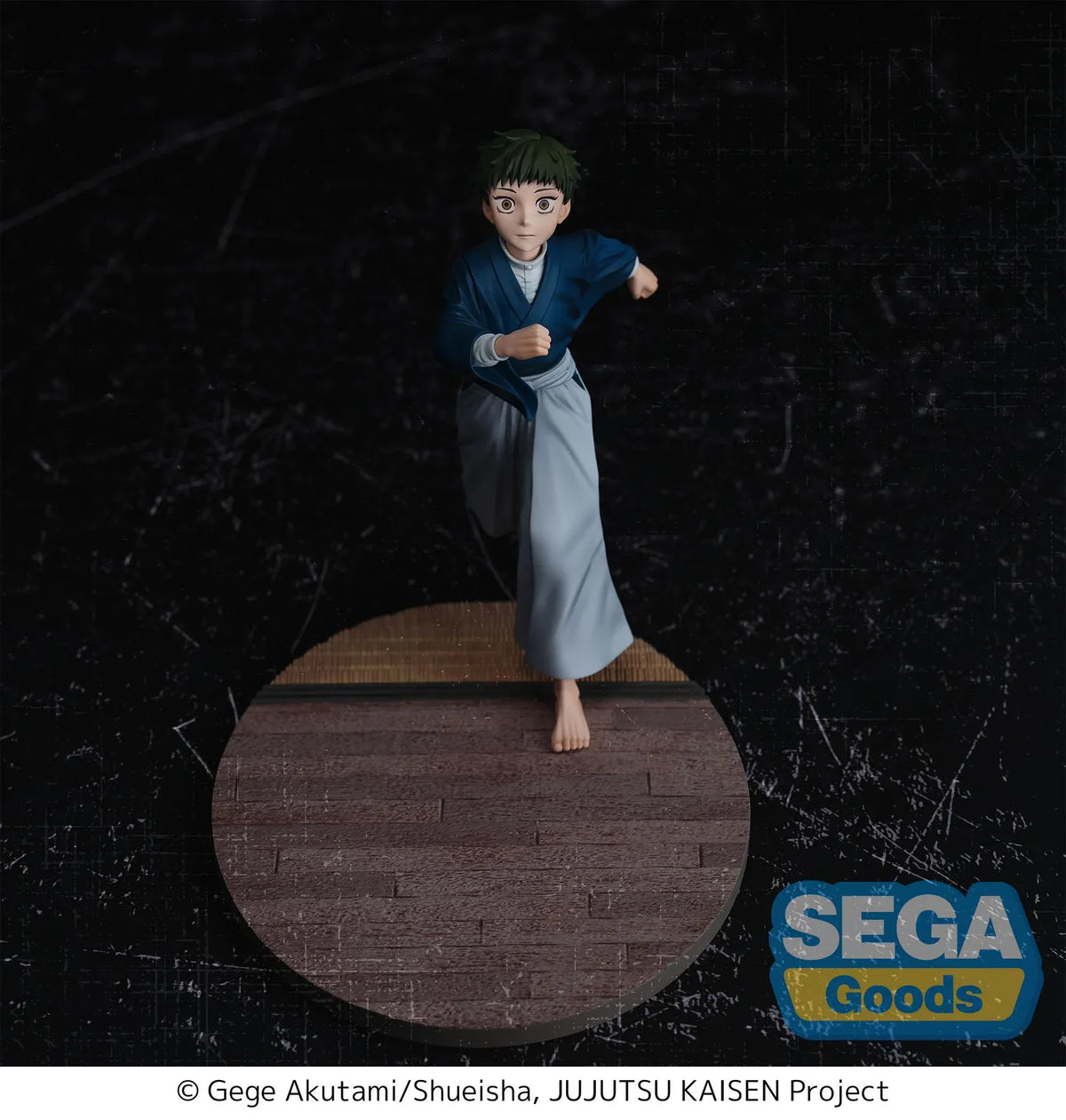 Luminasta Naoya Zen’in Childhood figure running barefoot in a blue top and gray hakama, smiling on an oval base with wood-style flooring.