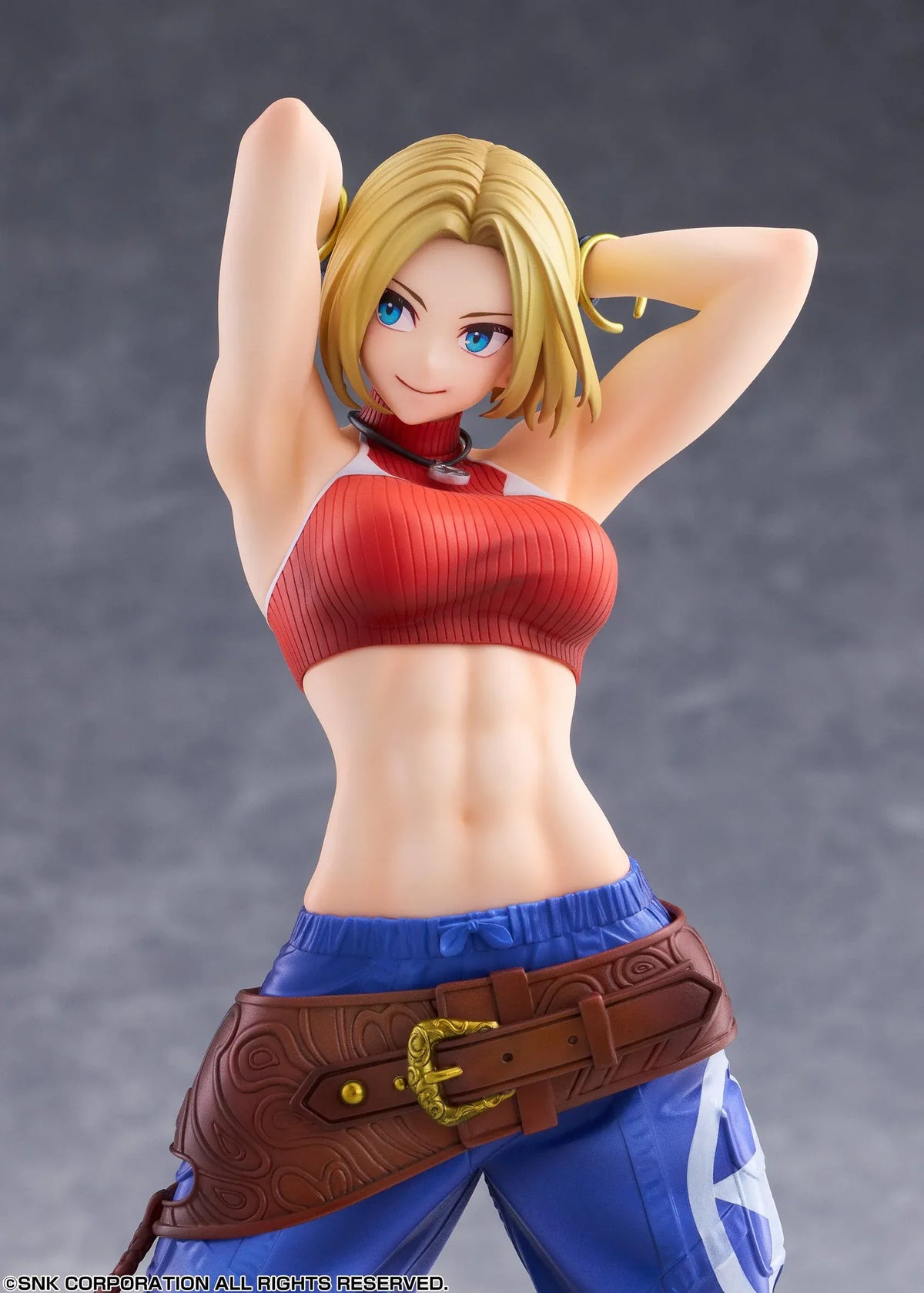Blue Mary Limited Edition 1/7 scale figure wearing a red crop top, blue pants, brown belt, and white sneakers in a confident standing pose.
