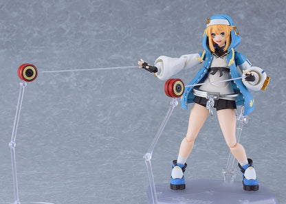 GUILTY GEAR STRIVE figma Bridget Figure featuring Bridget in a blue hoodie outfit with yo-yo accessory, oversized handcuff detail, and teddy bear companion.
