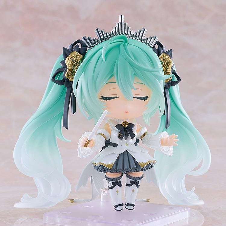 Hatsune Miku Nendoroid Hatsune Miku Symphony 10th Anniversary Ver. Figure featuring Miku with teal twin tails, white and black concert outfit, gold rose accents, and symphony-inspired details.