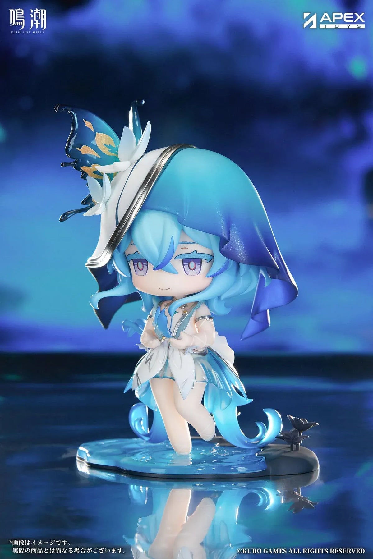 Chibi Shorekeeper Jinseki Series figure with blue hair, a butterfly-decorated headpiece, and a blue butterfly held in her hands, standing on a water-inspired base.