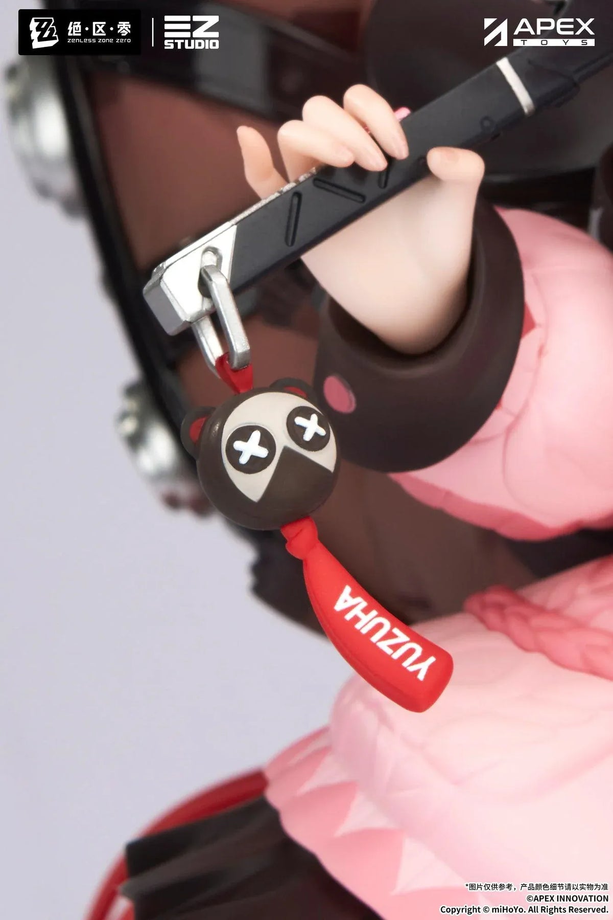 Zenless Zone Zero Yuzuha Ukinami 1/7 Scale Figure by APEX Toys featuring a red-haired anime girl with long braided twin-tails, green eyes, a pink jacket, layered red skirt, striped thigh-high stockings, and black boots while holding a large red umbrella on a circular display base.