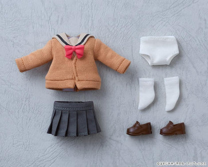 Bocchi the Rock Nendoroid Doll Ikuyo Kita featuring Kita with red hair, green eyes, a fabric cardigan outfit, skirt, socks, and loafers.
