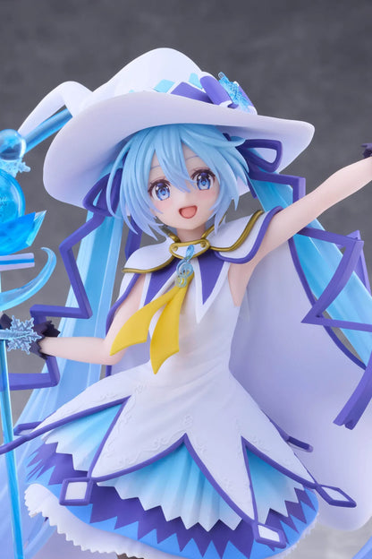 Snow Miku All Stars 2014 Ver. AMP+ figure wearing a white-and-blue snow sorceress outfit and holding a translucent magical staff.