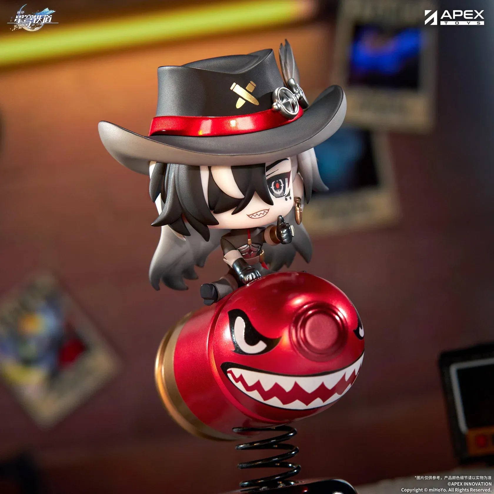 Honkai Star Rail Happy Shake Boothill Chibi Figure sitting on a red spring-mounted rocking base with his signature cowboy hat