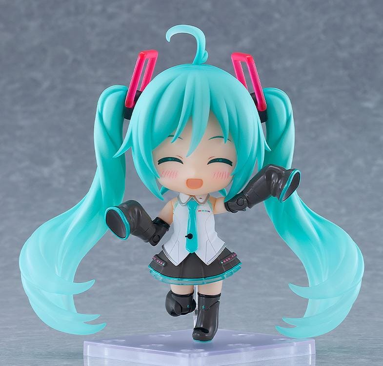 Hatsune Miku Nendoroid Hatsune Miku HMO Ver. Figure featuring Miku with teal twin tails, red glasses, colorful cable-style hair accessories, and music-inspired outfit details.