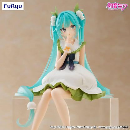 Seated Hatsune Miku Flower Fairy Lily of the Valley noodle stopper figure in a white and green dress with long twin-tails and lily-of-the-valley hair accessories.